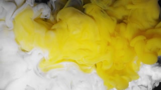 Colored Yellow Cloude Ink, Spreading in Water and Falling Lemon Colored Smoke, Wipes the Frame From. Colored yellow cloude ink, spreading in water and falling lemon Colored smoke, wipes the frame from top to bottom in slow motion